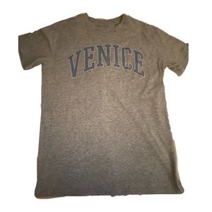 t-shirt, brand: mighty fine size: xs in women’s, all gray back.